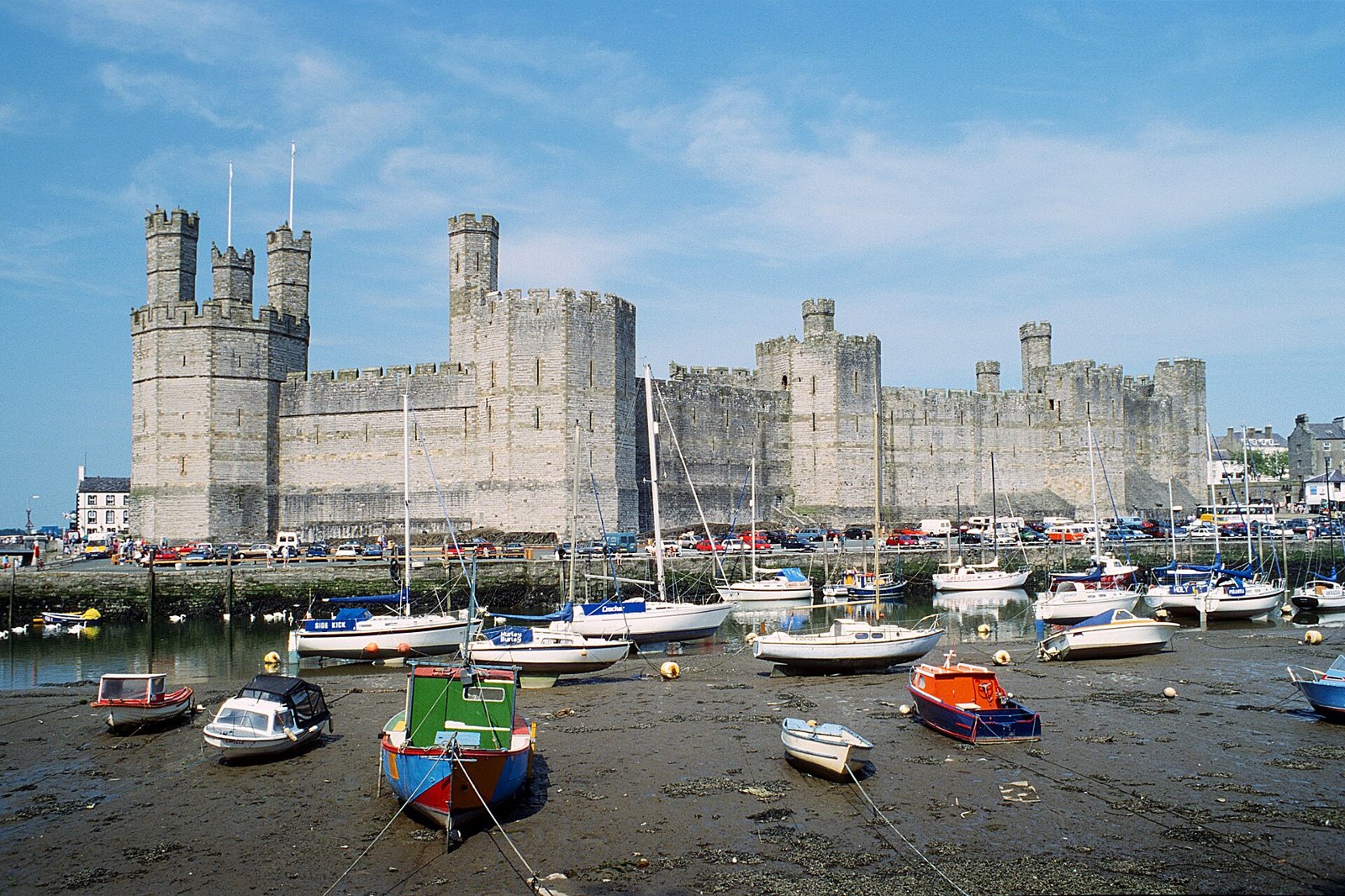 Caernarfon Castle's polygonal towers beside the river Seiont