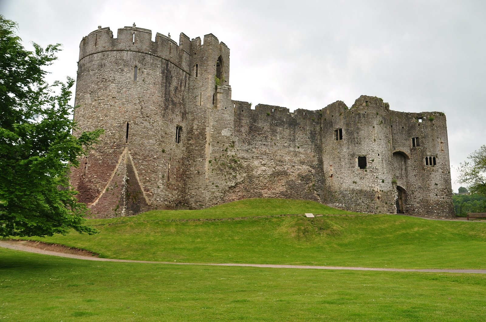 Chepstow Castle's long walls on a cliff above the River Wye