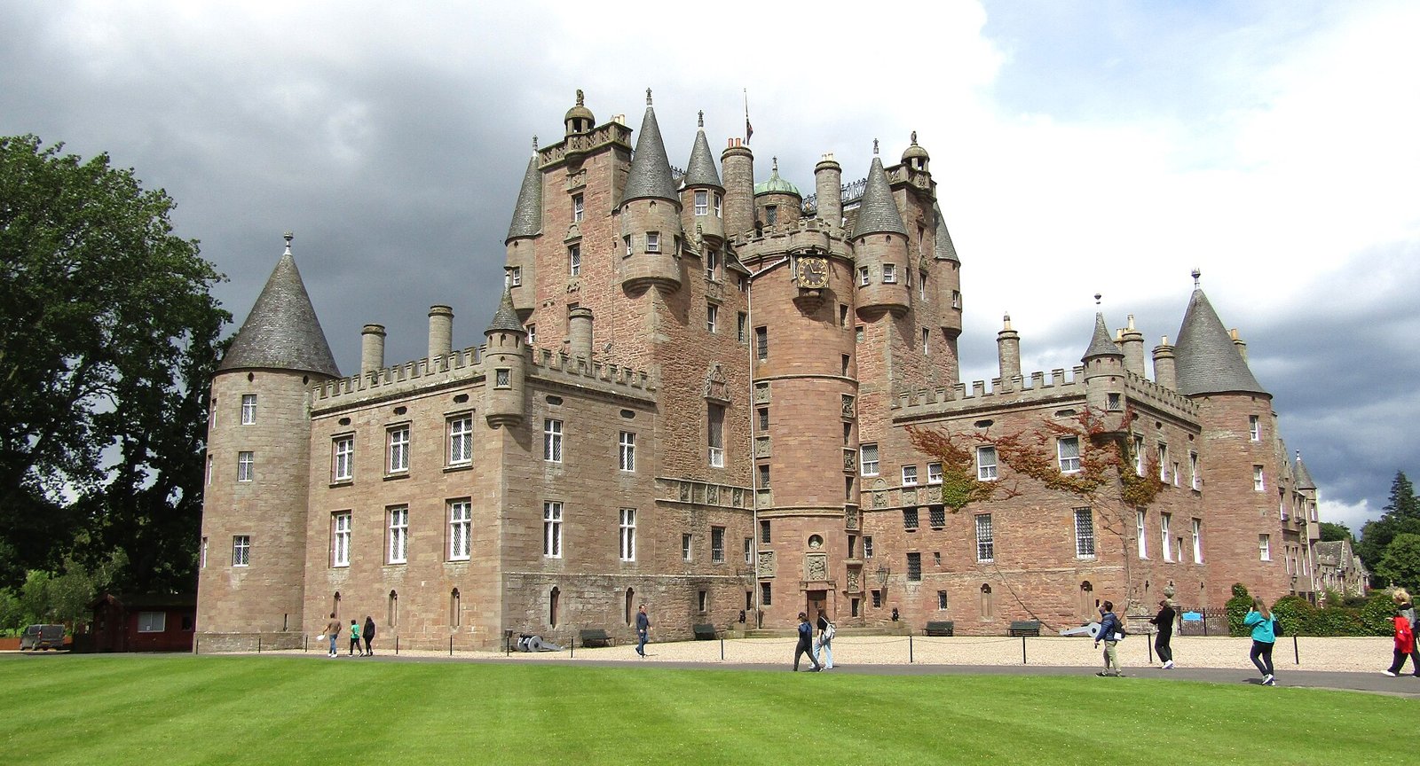 Glamis Castle with its towers and turrets in the Angus countryside