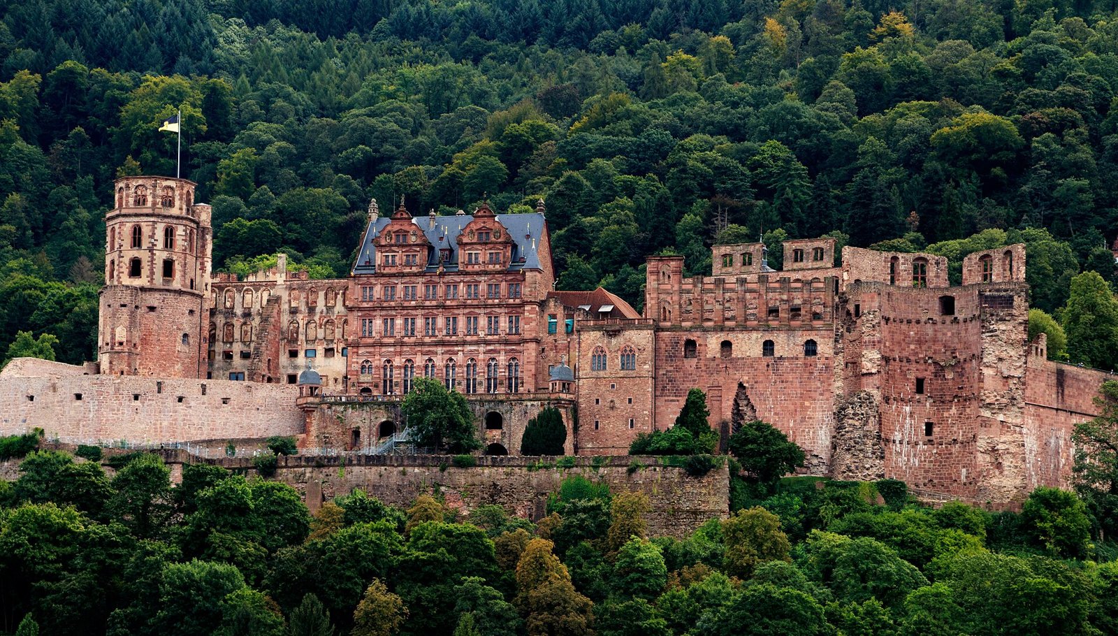The red sandstone ruins of Heidelberg Castle above the Neckar river