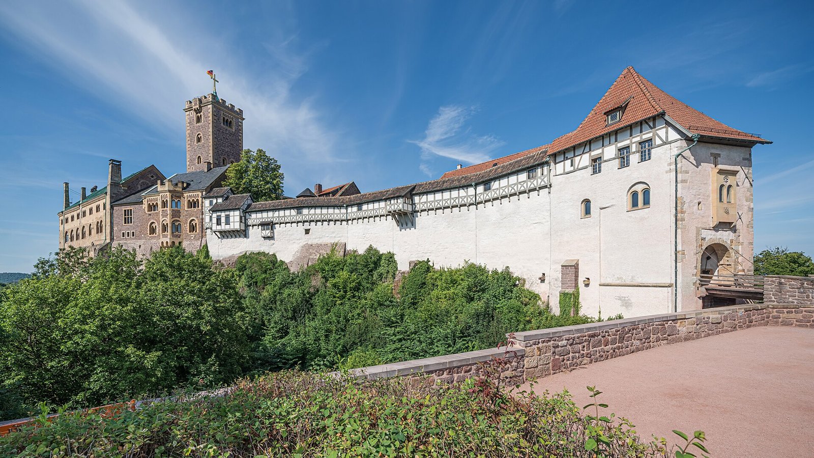 The Wartburg castle on a forested hill above Eisenach